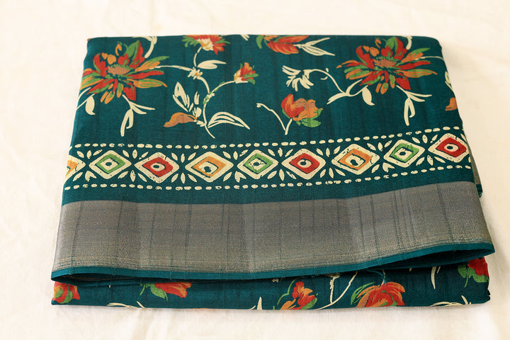 Regal Radiance Peacock Green Silk Cotton Saree with Floral Designs, Patterned Pallu, and Round Butta Blouse