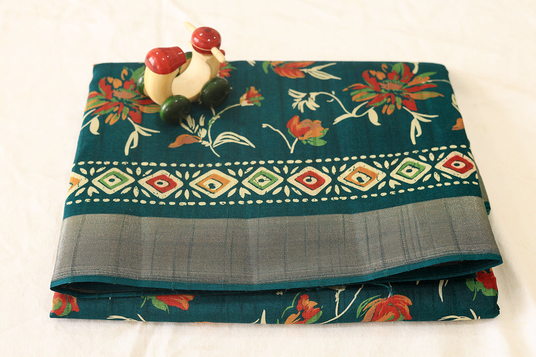 Regal Radiance Peacock Green Silk Cotton Saree with Floral Designs, Patterned Pallu, and Round Butta Blouse