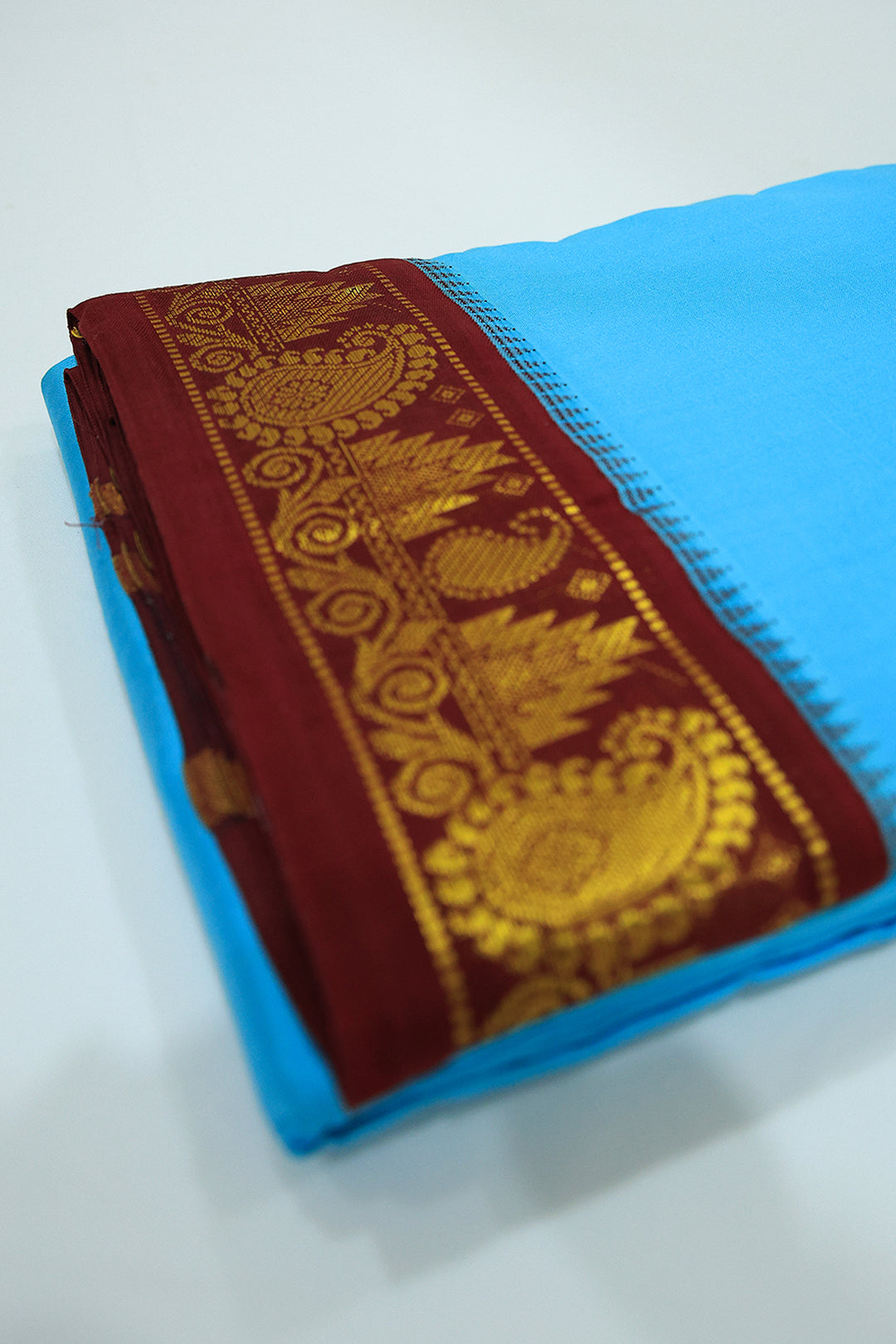 Sri Vaari Vasthram – Pure Silk Devotional Dhoti with Dual Contrast Borders in Red and Blue