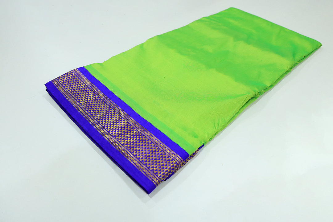 Sri Vaari Vasthram – Parrot Green With Royal Blue Pure Silk Devotional Dhoti with Contrast Borders and Zari Accents