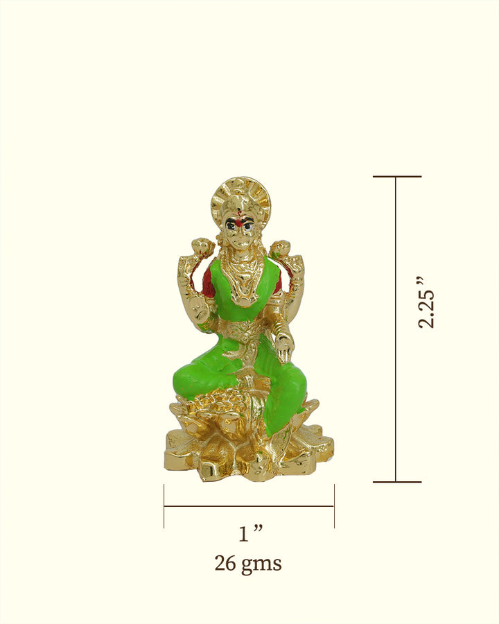 2.25" லட்சுமி பச்சை நிற புடவையுடன் தாமரை மீது அமர்ந்துள்ளார்