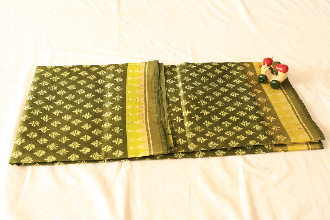 Leaf Green Saree Adorned With Lotus Designs, Mint Yellow Border And Floral Bliss Blouse