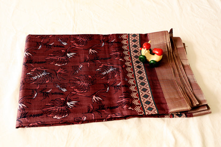 Rich Grape Cotton Fancy Saree With Silver Zari, Leaf Designs And Square Butta Blouse