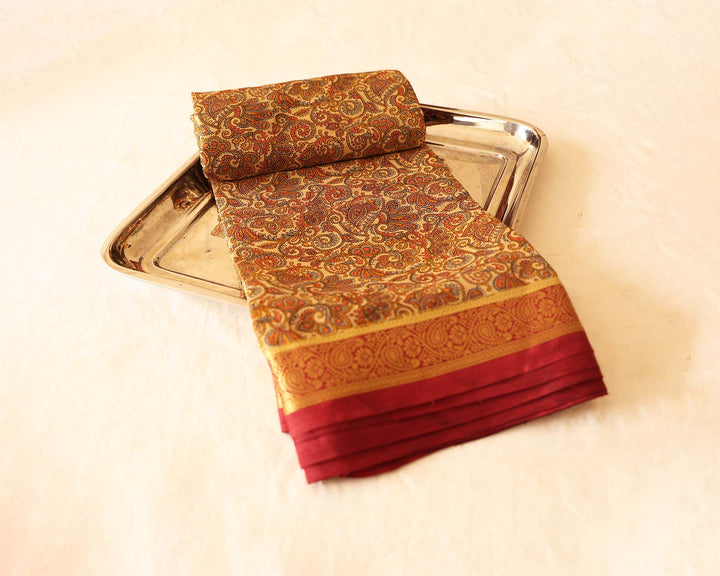 Printed Soft Silk Saree With Kalamkari Design, Contrasting Gold Zari Floral Border And Running Blouse