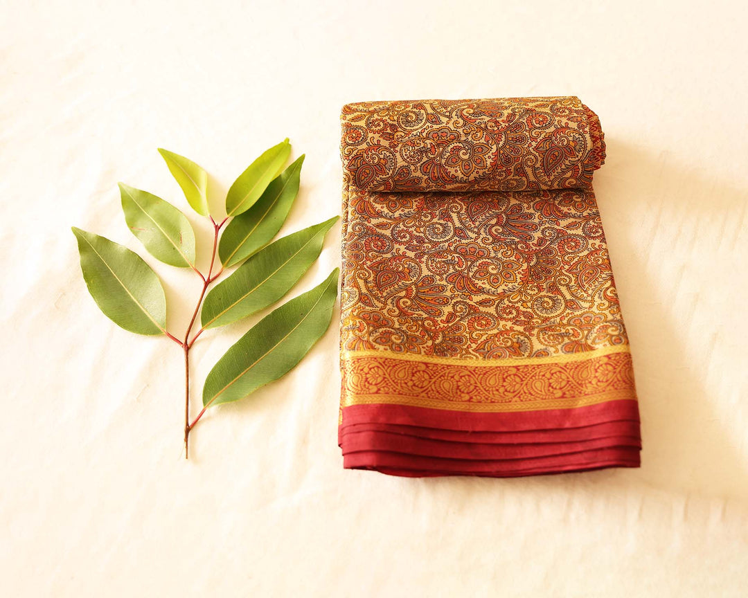 Printed Soft Silk Saree With Kalamkari Design, Contrasting Gold Zari Floral Border And Running Blouse