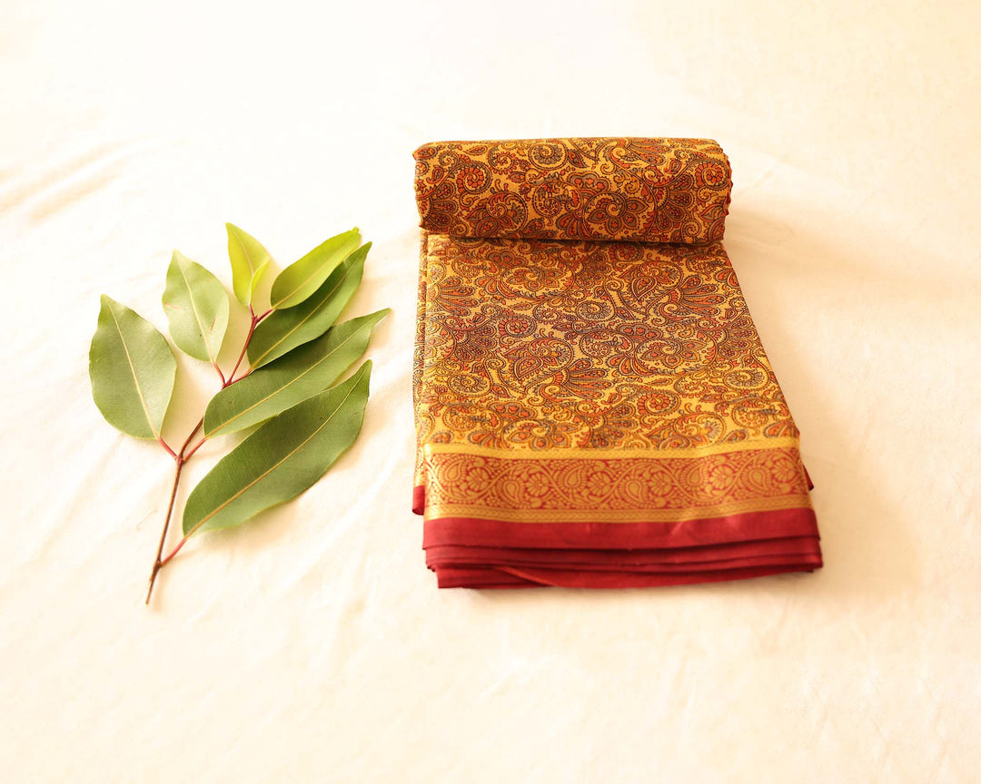 Printed Soft Silk Saree With Kalamkari Design, Contrasting Gold Zari Floral Border And Running Blouse