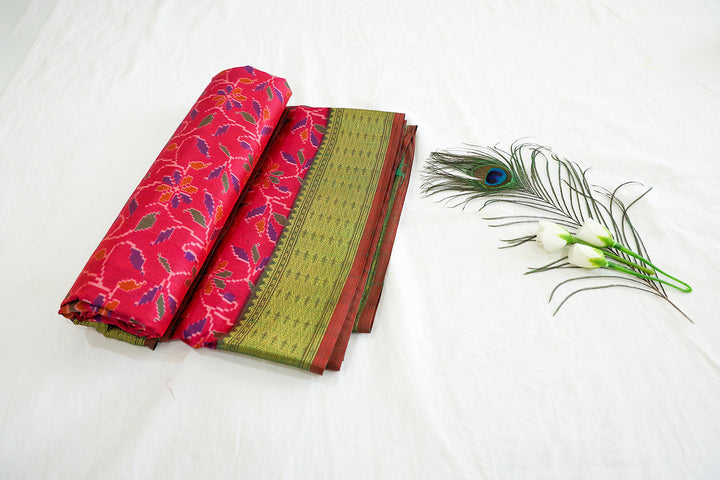 Pink Cotton Saree With Graph Floral Pattern Design, Opulent Golden Zari Contrast Green Border And Matching Blouse