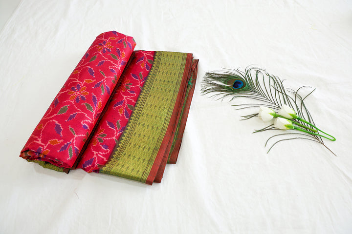 Pink Cotton Saree With Graph Floral Pattern Design, Opulent Golden Zari Contrast Green Border And Matching Blouse