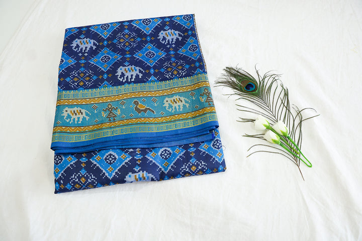 Dark Blue Cotton Saree With Graph Elephant Pattern Design, Opulent Golden Zari Contrast Sky Blue Border And Matching Blouse