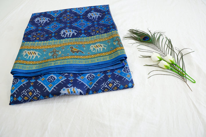 Dark Blue Cotton Saree With Graph Elephant Pattern Design, Opulent Golden Zari Contrast Sky Blue Border And Matching Blouse