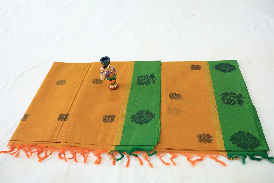 Charming Silk Cotton Saree With Contrasting Floral Border And Flower Buttas With  Running Blouse