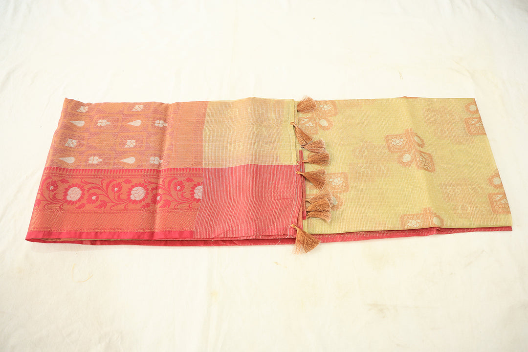 Sandal Glow Tissue Silk Saree With Pink Border And Copper-Silver Zari Floral Embellishments