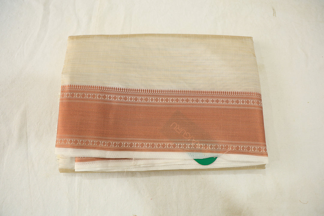 Ivory Silk Cotton Saree With Copper Zari Border And Coordinated Blouse