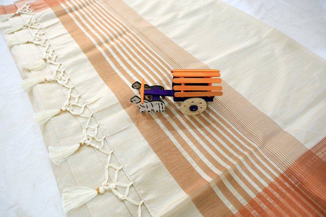 Ivory Silk Cotton Saree With Copper Zari Border And Coordinated Blouse