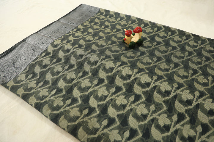 Black Saree Adorned With Sandal Floral Elegance And Silver Zari Border