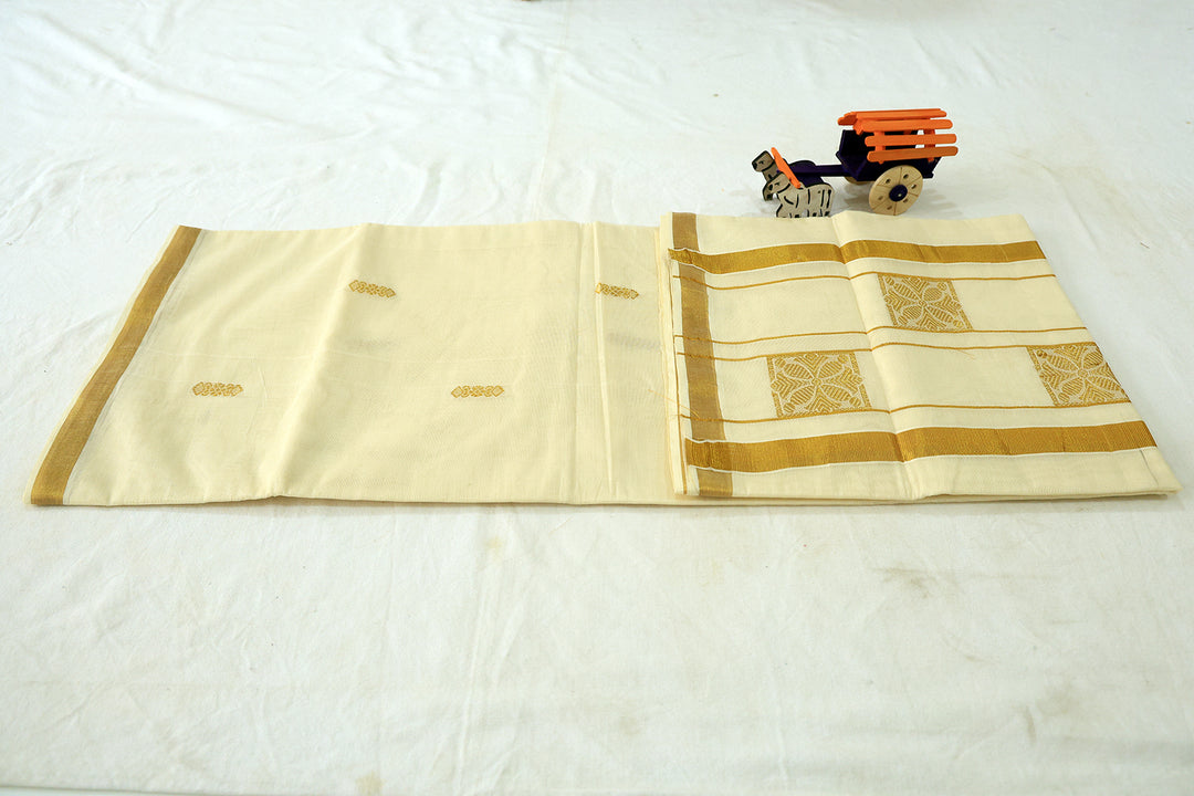 Onam Bliss Off-White Saree with Golden Zari Border, Elegant Buttas, And Coordinated Running Blouse