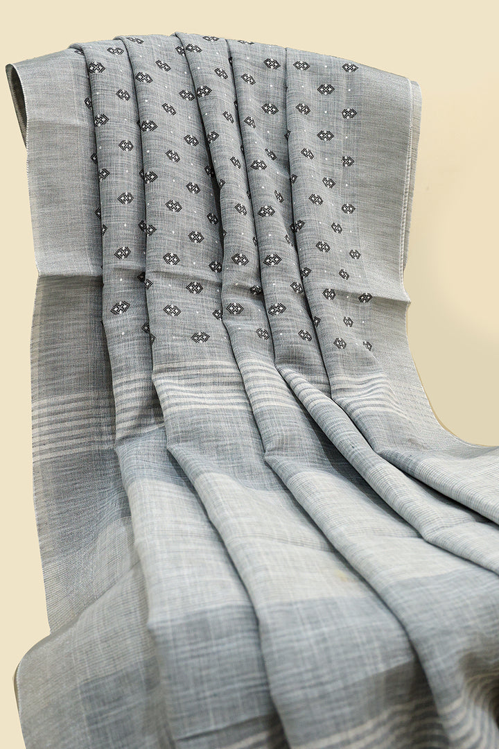 Linen Grey Cotton Saree With Silver Zari Border, Black And White Buttas With Running Blouse