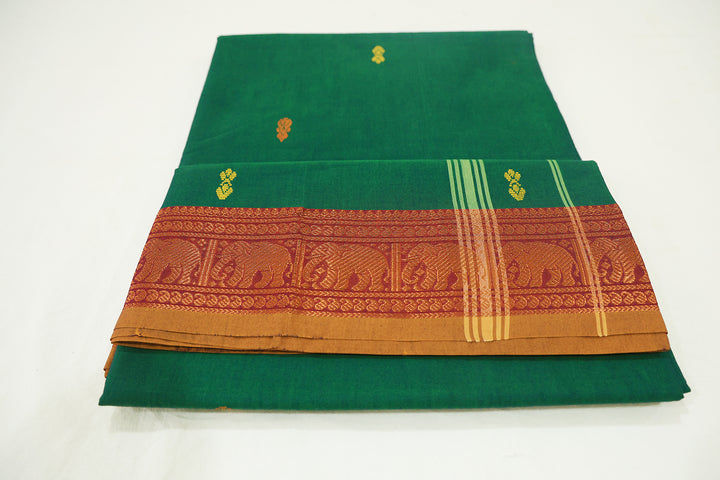 Dark Green Saree With Amber Border, Intricate Elephant Zari Designs And Scattered Flower Buttas