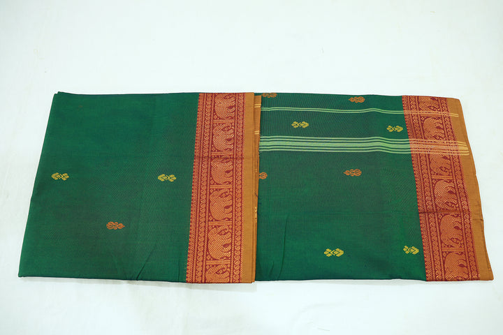 Dark Green Saree With Amber Border, Intricate Elephant Zari Designs And Scattered Flower Buttas