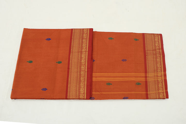 Rusty Orange Saree With Red Border, Peacock Zari Embellishments And Floral Whispers