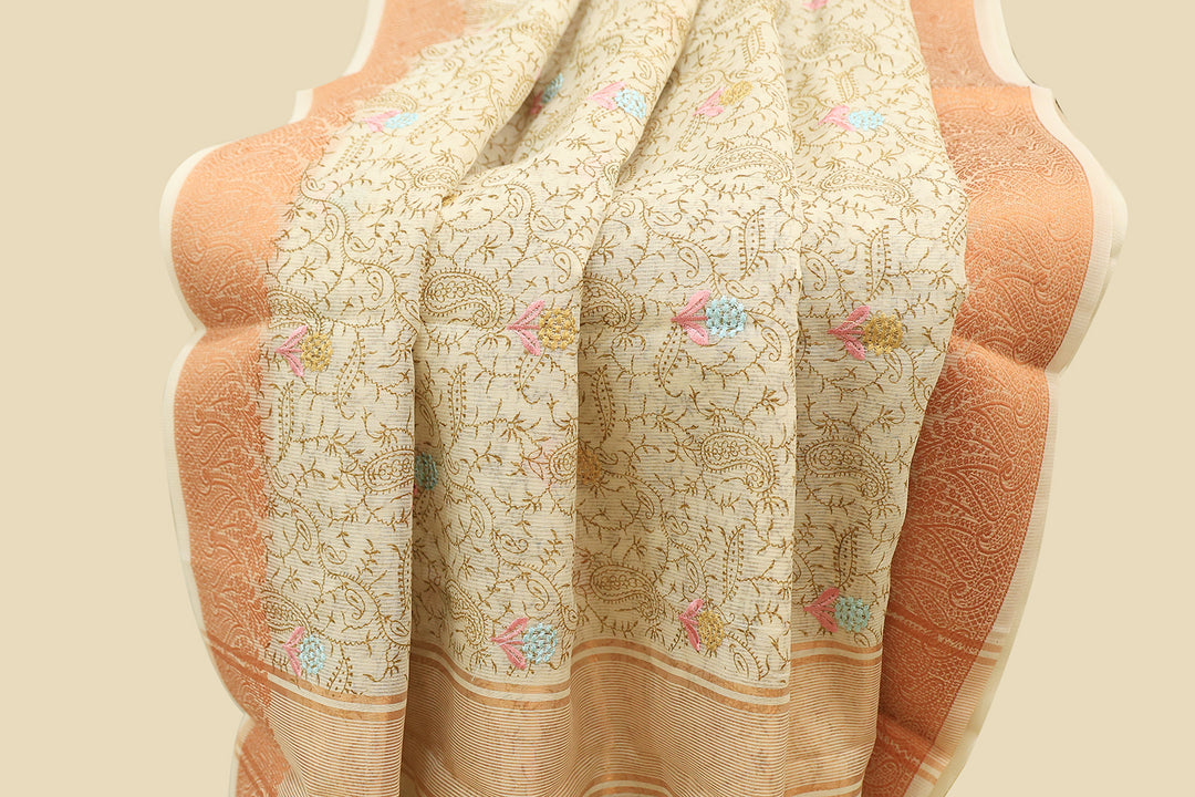 Beige Cotton Saree With Copper Zari Border And Intricate Floral Embroidery