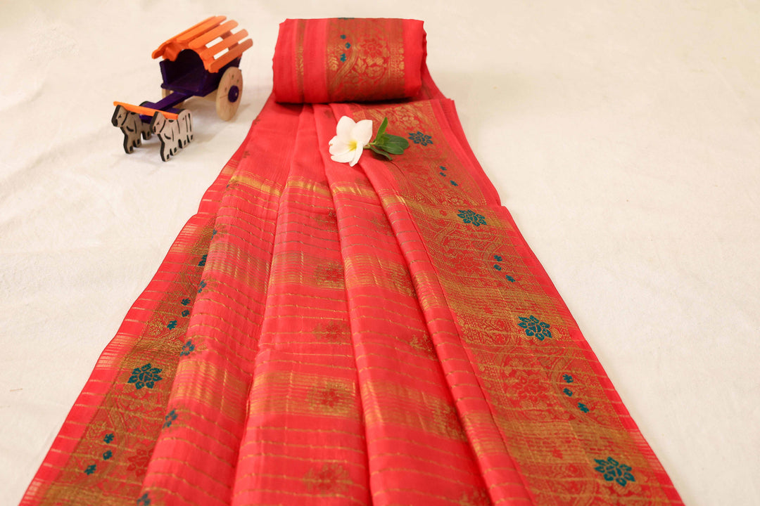 Soft Silk Saree With Gold Zari Floral Border, Artistic Buttas And Running Blouse