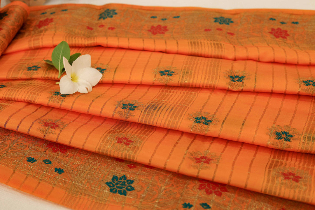 Soft Silk Saree With Gold Zari Floral Border, Artistic Buttas And Running Blouse