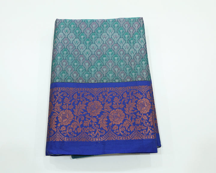 Peacock Green And Ink Blue Dupion Silk Saree With Golden Zari Floral And Leaf Motifs