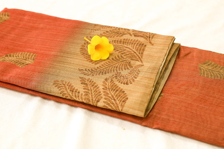 Silk Cotton Saree in Orange with Sandal Leaf Border and Intricate Leaf Butta Design