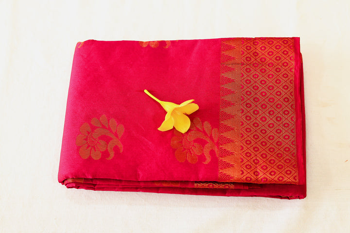 Hot Pink Silk Cotton Saree with Copper Zari Border and Floral Buttas