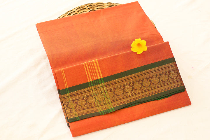 Orange Cotton Saree with Green Gold Zari Border and Floral Buttas