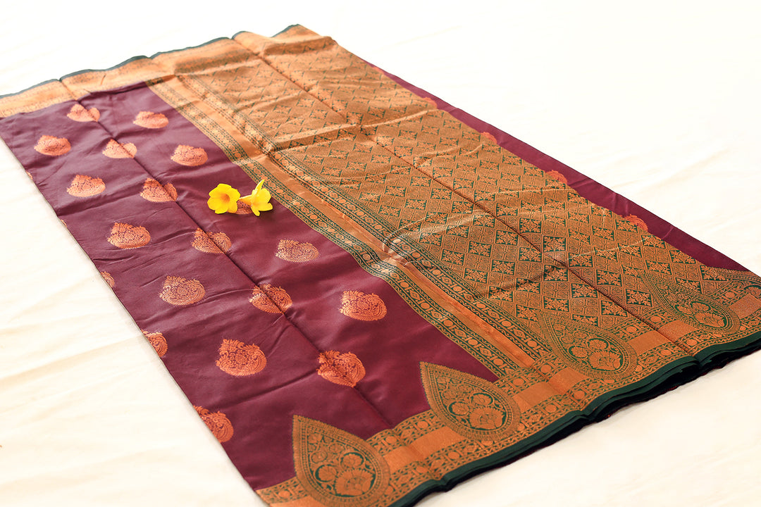 Burgundy Silk Cotton Saree with Dark Green Floral Buttas and Border