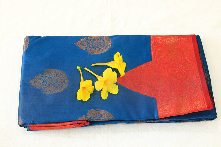 Silk Cotton Saree in Azure Blue with Red Copper Zari Border and Floral Buttas