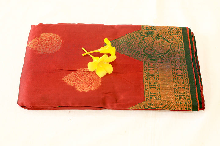 Maroon Silk Cotton Saree with Green Copper Zari Border, Floral Buttas, and Contrast Pallu