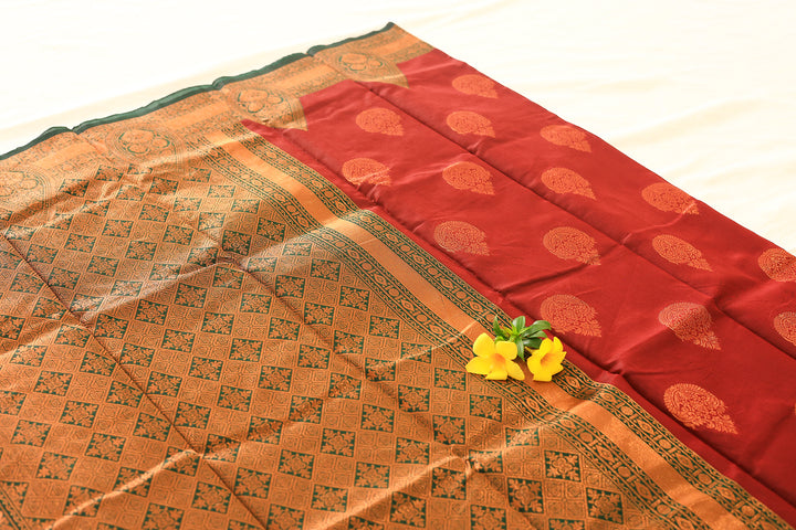 Maroon Silk Cotton Saree with Green Copper Zari Border, Floral Buttas, and Contrast Pallu