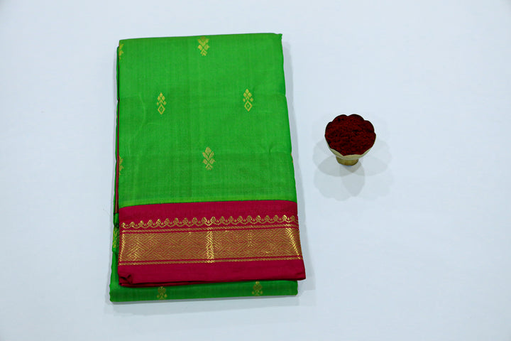 Kanchipuram Pure Silk Saree With Contrast Border, Gold Zari Accents And Tassels