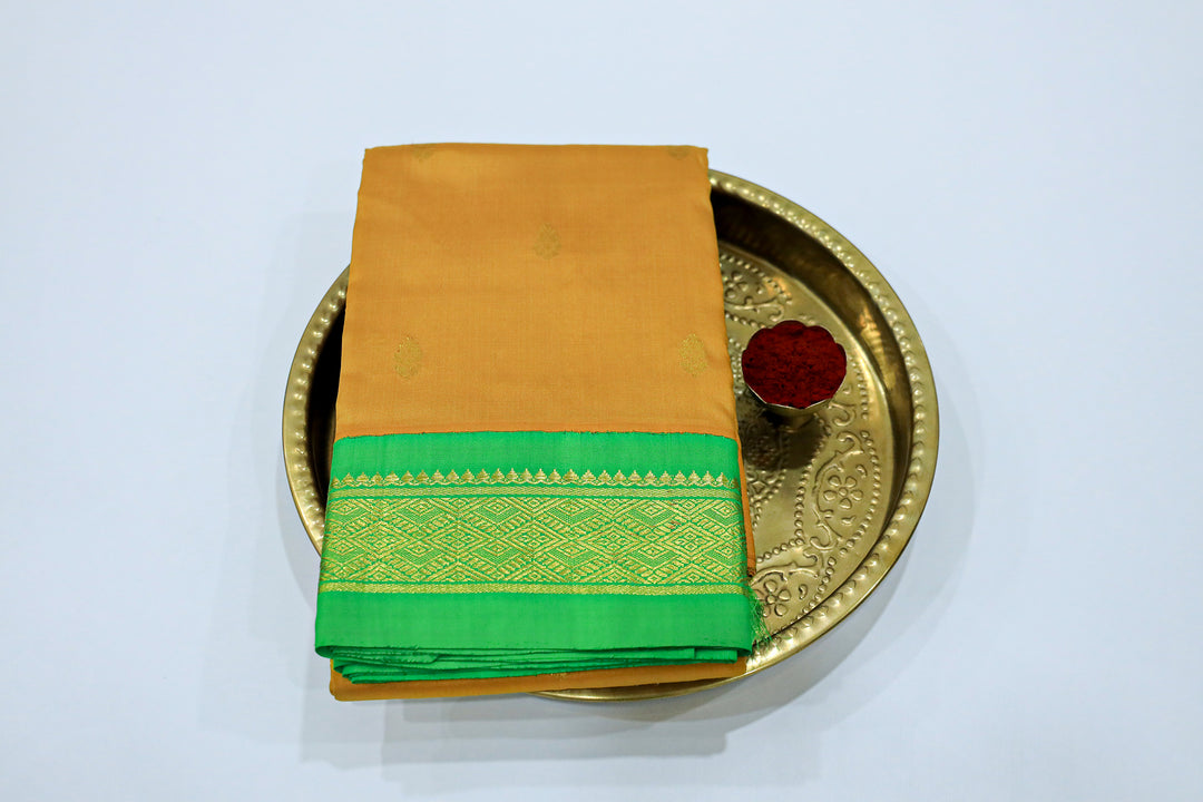 Kanchipuram Pure Silk Saree With Contrast Border, Gold Zari Accents And Tassels