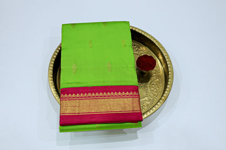 Kanchipuram Pure Silk Saree With Contrast Border, Gold Zari Accents And Tassels