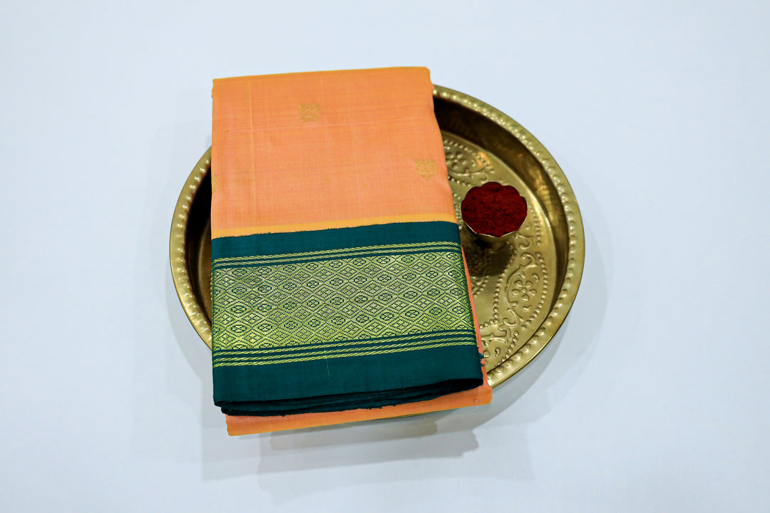 Kanchipuram Pure Silk Saree With Contrast Border, Gold Zari Accents And Tassels