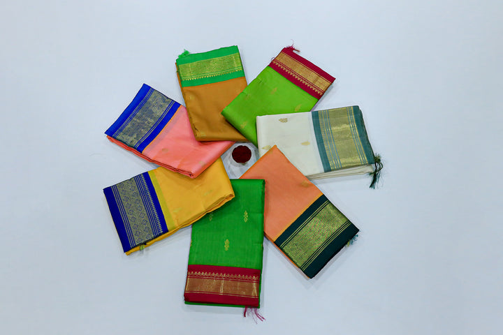 Kanchipuram Pure Silk Saree With Contrast Border, Gold Zari Accents And Tassels