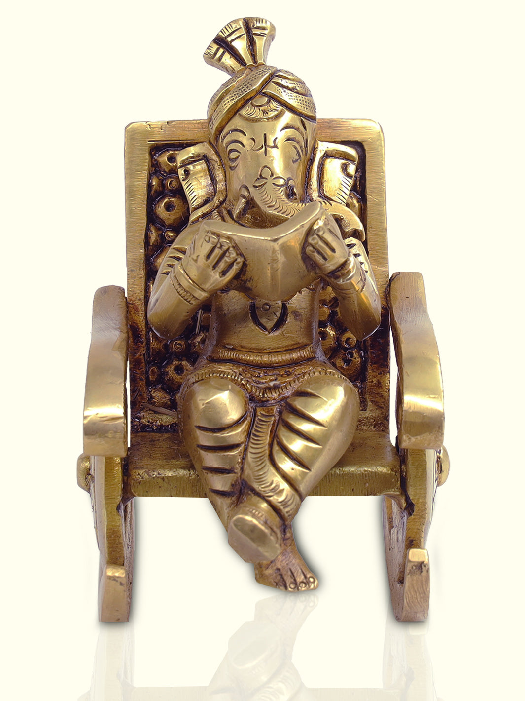 4.5" Brass Ganesha seated in a Rocking Chanr - Sripuram Store